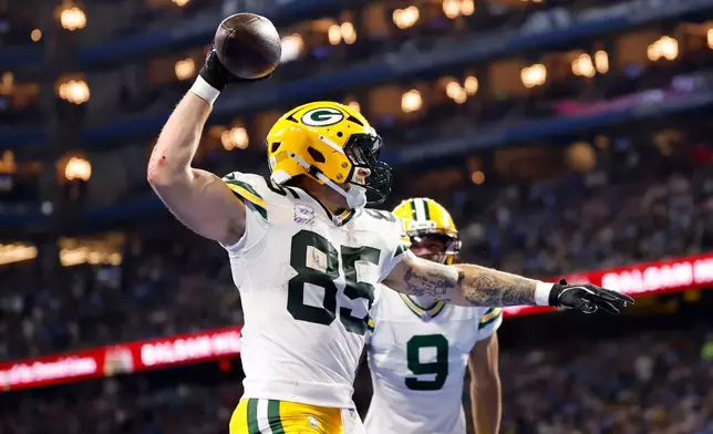 Green Bay Packers tight end Tucker Kraft (85) celebrates after catching a touchdown pass during the first half of an NFL football game against the Detroit Lions, Sunday, Oct. 25, 2026, in Detroit. (AP Photo/Rey Del Rio)