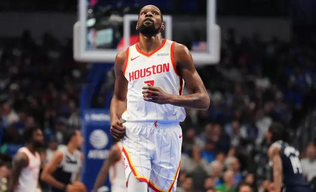 Houston Rockets' Kevin Durant jogs up court after taking a shot during the first half of an NBA Cup basketball game against the Dallas Mavericks in Dallas, Friday, Oct. 30, 2026. (AP Photo/Tony Gutierrez)