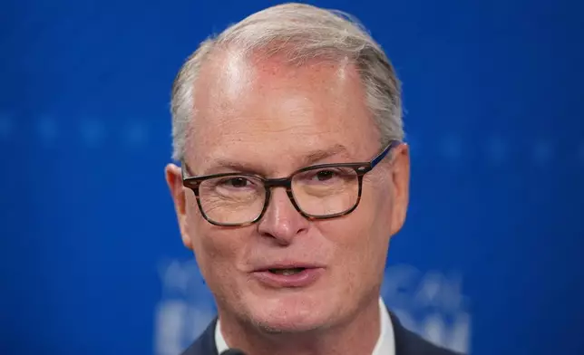 Democratic nominee for U.S. Senate Adam Hamilton talks to the media after a debate with Republican Sen. Roger Marshall at WDAF TV in Kansas City, Mo., Wednesday, Oct. 21, 2026. (AP Photo/Charlie Riedel)