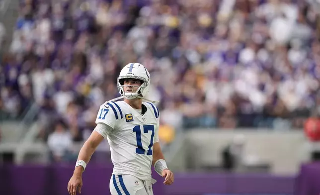 Indianapolis Colts quarterback Daniel Jones (17) walks on the field during the first half of an NFL football game against the Minnesota Vikings in Minneapolis, Sunday, Oct. 25, 2026. (AP Photo/Ellen Schmidt)