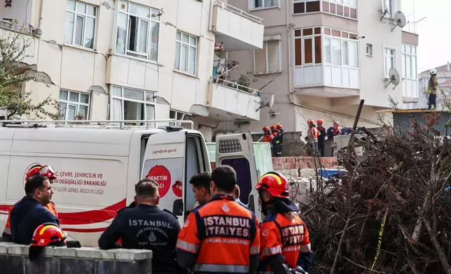 Firefighters and rescue team members work next to a partially collapsed seven-storey building in Istanbul, Thursday, Oct. 8, 2026. (Abdullah Tepeli/DIA Photo via AP)