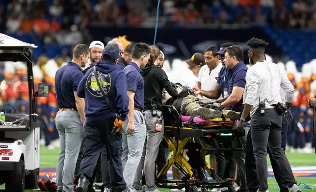 Emergency responders react to an accident before UTSA’s annual Salute to Armed Forces and Veterans football game at the Alamodome, Saturday, Oct. 17, 2026 in San Antonio, Texas. (Cody Duty/The San Antonio Express-News via AP)