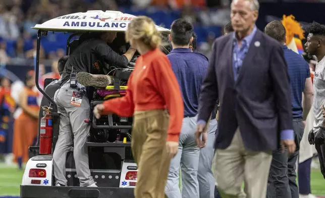 Emergency responders react to an accident before UTSA’s annual Salute to Armed Forces and Veterans football game at the Alamodome, Saturday, Oct. 17, 2026 in San Antonio, Texas. (Cody Duty/The San Antonio Express-News via AP)