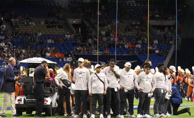 Emergency responders react to an accident before UTSA’s annual Salute to Armed Forces and Veterans football game at the Alamodome, Saturday, Oct. 17, 2026 in San Antonio, Texas. (Cody Duty/The San Antonio Express-News via AP)