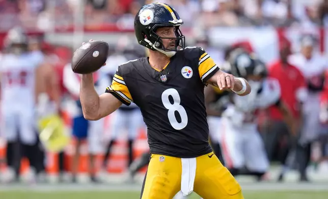 Pittsburgh Steelers quarterback Aaron Rodgers (8) aims a pass during the second half of an NFL football game against the Tampa Bay Buccaneers in Tampa, Fla., Sunday, Oct. 18, 2026. (AP Photo/Chris O'Meara)
