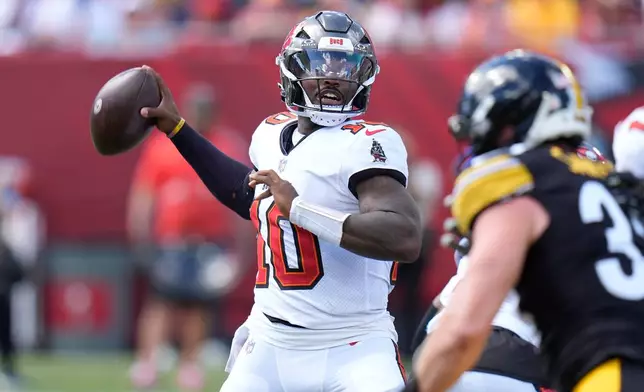 Tampa Bay Buccaneers quarterback Jalon Daniels (10) aims a pass during the first half of an NFL football game against the Pittsburgh Steelers in Tampa, Fla., Sunday, Oct. 18, 2026. (AP Photo/Chris O'Meara)