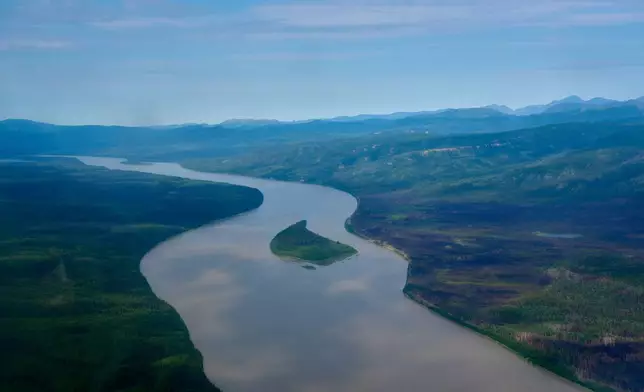 The Yukon River winds through Alaska, Friday, July 10, 2026. (AP Photo/Annika Hammerschlag)