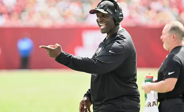 Tampa Bay Buccaneers head coach Todd Bowles gestures to a referee during the first half of an NFL football game against the Green Bay Packers in Tampa, Fla., Sunday, Oct. 4, 2026. (AP Photo/Jason Behnken)