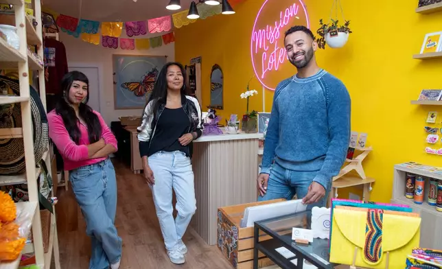 Store associate Dalia Rangel, store manager Paloma Flores and CEO Luis Quiroz pose for a portrait at the Mission Loteria store on Friday, Oct. 9, 2026, in San Francisco. (AP Photo/Akash Pamarthy)