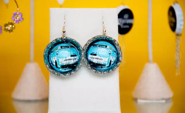 Artwork featuring local references is displayed at the Mission Loteria store on Friday, Oct. 9, 2026, in San Francisco. (AP Photo/Akash Pamarthy)