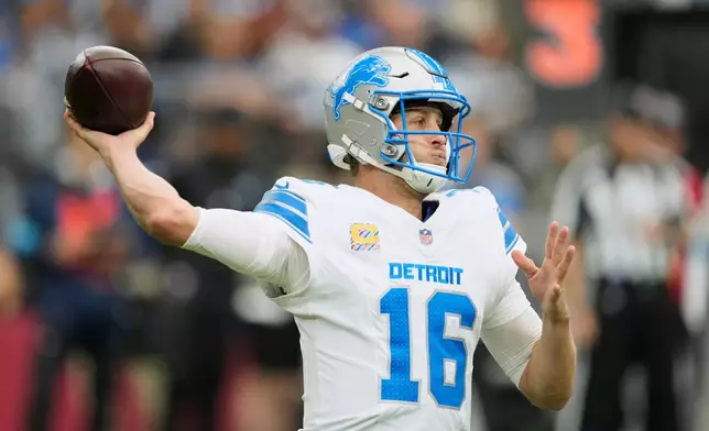 Detroit Lions quarterback Jared Goff (16) throws against the Arizona Cardinals during the first half of an NFL football game in Glendale, Ariz., Sunday, Oct. 11, 2026. (AP Photo/Ross D. Franklin)