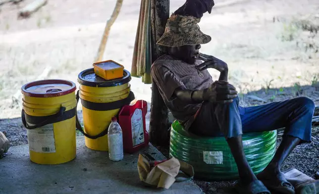A gold miner rests in one of the mining camps on the outskirts of Paramaribo, Suriname, Saturday, Sept. 26, 2026. (AP Photo/Ivan Valencia)