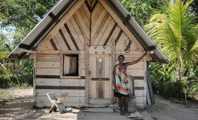 Alingo Doekoe, a Saamaka leader and wood carver, poses for a photo in Pikienslee, Suriname, Monday, Sept. 28, 2026. (AP Photo/Ivan Valencia)