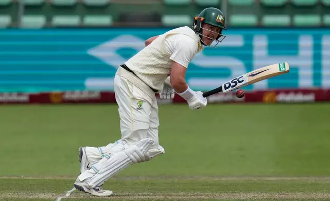 Australia's Matt Renshaw plays a shot on day four of the second cricket test match between South Africa and Australia, in Gqeberha, South Africa, Wednesday, Oct. 21, 2026. (AP Photo/Themba Hadebe)