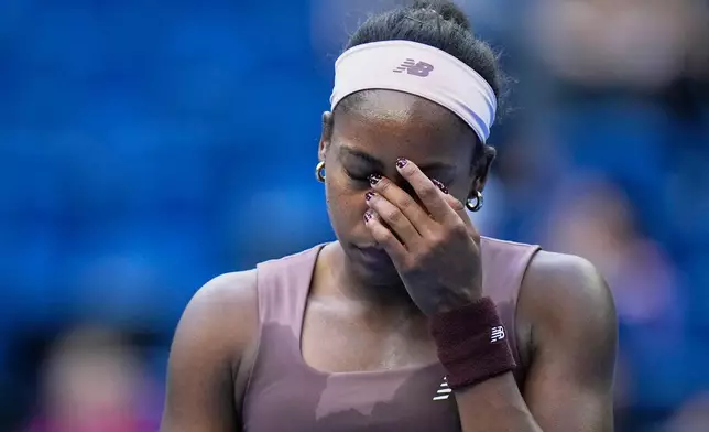 Coco Gauff of the United States reacts during play against Elise Mertens of Belgium during the fourth round of the women's singles match at the China Open tennis tournament in Beijing, Wednesday, Oct. 7, 2026. (AP Photo/Andy Wong)