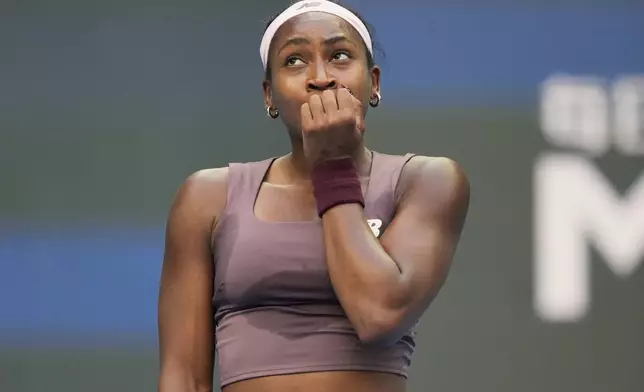 Coco Gauff of the United States reacts during play against Elise Mertens of Belgium during the fourth round of the women's singles match at the China Open tennis tournament in Beijing, Wednesday, Oct. 7, 2026. (AP Photo/Achmad Ibrahim)