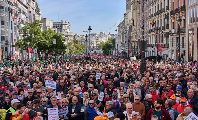 Pensioners and supporters march to defend their retirement rights in Madrid, Spain, Saturday, Oct. 24, 2026. (AP Photo/Bernat Armangue)