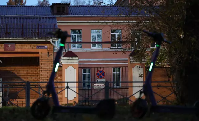 Electric scooters are parked next to the building of the Irkutsk Anti-Plague Research Institute of Siberia and the Far East in Irkutsk, Russi, on Wednesday, Oct. 7, 2026. (AP Photo)