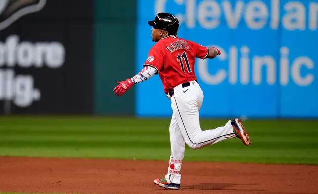 Cleveland Guardians third baseman José Ramírez celebrates after hitting a home run in the fourth inning of Game 5 of baseball's American League Division Series against the Chicago White Sox, Saturday, Oct. 10, 2026, in Cleveland. (AP Photo/Sue Ogrocki)