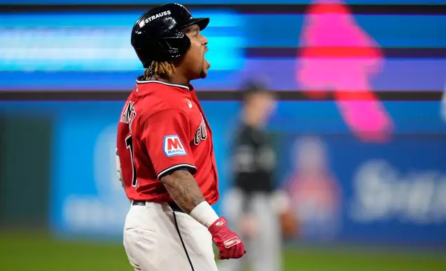 Cleveland Guardians third baseman José Ramírez celebrates after hitting a home run in the fourth inning of Game 5 of baseball's American League Division Series against the Chicago White Sox, Saturday, Oct. 10, 2026, in Cleveland. (AP Photo/Sue Ogrocki)