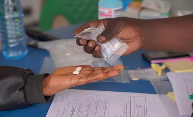 Pills are provided to enrolled patients during clinical trials attempting to stop the rare Bundibugyo virus, amidst a deadly Ebola outbreak, in Rwampara Hospital in Ituri, Congo, Thursday, Oct. 1, 2026. (AP Photo/Dieudonne Dirole)