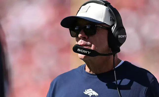 Denver Broncos head coach Sean Payton walks on the sideline during the first half of an NFL football game against the San Francisco 49ers in Santa Clara, Calif., Sunday, Oct. 4, 2026. (AP Photo/Justine Willard)