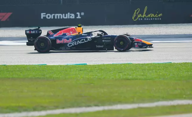 Red Bull driver Max Verstappen of the Netherlands steers his car during the qualifying session ahead of the Bahrain Grand Prix in Sepang, Malaysia, Saturday, Oct. 3, 2026. (AP Photo/Aijaz Rahi)