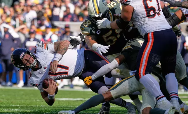 Green Bay Packers cornerback Brandon Cisse sacks Chicago Bears' Tyson Bagent during the first half of an NFL football game in Green Bay, Wis., Sunday, Oct. 11, 2026. (AP Photo/Nam Huh)