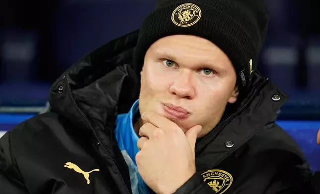 Manchester City's Erling Haaland sits on the bench before the Champions League soccer match between Manchester City and AEK Athens in Manchester, England, Tuesday, Oct. 20, 2026. (AP Photo/Dave Thompson)
