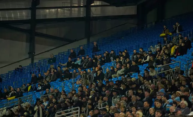 Half-empty stand is seen during the Champions League soccer match between Manchester City and AEK Athens in Manchester, England, Tuesday, Oct. 20, 2026. (AP Photo/Dave Thompson)