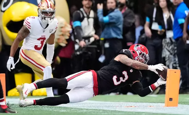 Atlanta Falcons safety Jessie Bates III (3) intercepts a San Francisco 49ers' Brock Purdy pass during the second half of an NFL football game in Atlanta, Sunday, Oct. 25, 2026. (AP Photo/Mike Stewart)