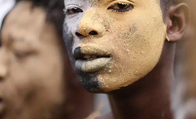 A boy participates in a re-enactment of the Akatamanso War during the Odwira Festival celebrations in Larteh, Ghana, Wednesday, Sept. 30, 2026. (AP Photo)