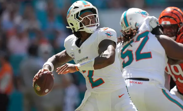 Miami Dolphins quarterback Malik Willis (2) aims a pass during the first half of an NFL football game against the Cincinnati Bengals in Miami Gardens, Fla., Sunday, Oct. 11, 2026. (AP Photo/Rebecca Blackwell)