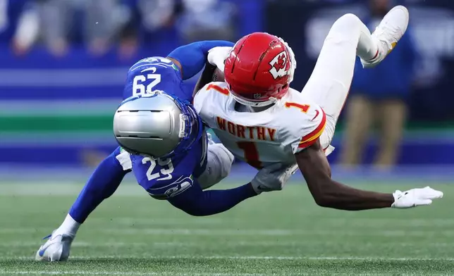 Seattle Seahawks cornerback Josh Jobe (29) tackles Kansas City Chiefs wide receiver Xavier Worthy (1) after a catch during the first half of an NFL football game in Seattle, Sunday, Oct. 25, 2026. (AP Photo/Kevin Ng)