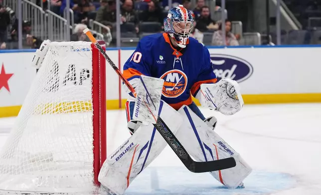 New York Islanders goaltender Ilya Sorokin protects the net during the first period of an NHL hockey game against the Chicago Blackhawks Thursday, Oct. 8, 2026, in Elmont, N.Y. (AP Photo/Frank Franklin II)
