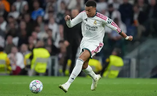 Real Madrid's Kylian Mbappe is in action during the Champions League opening phase soccer match between Real Madrid and Leipzig in Madrid, Wednesday, Oct. 21, 2026. (AP Photo/Bernat Armangue)