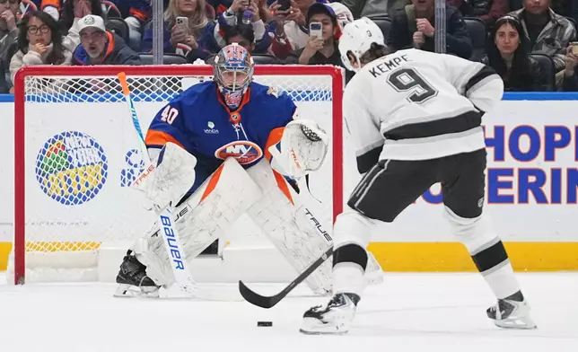 New York Islanders goaltender Semyon Varlamov (40) protects the net from Los Angeles Kings' Adrian Kempe (9) during a penalty shot during the second period of an NHL hockey game Thursday, Oct. 22, 2026, in Elmont, N.Y. (AP Photo/Frank Franklin II)