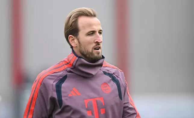 Bayern Munich's Harry Kane attends a training session ahead of the Champions League, opening phase soccer match against Arsenal, in Munich, Germany, Tuesday, Oct. 20, 2026. (Angelika Warmuth/dpa via AP)