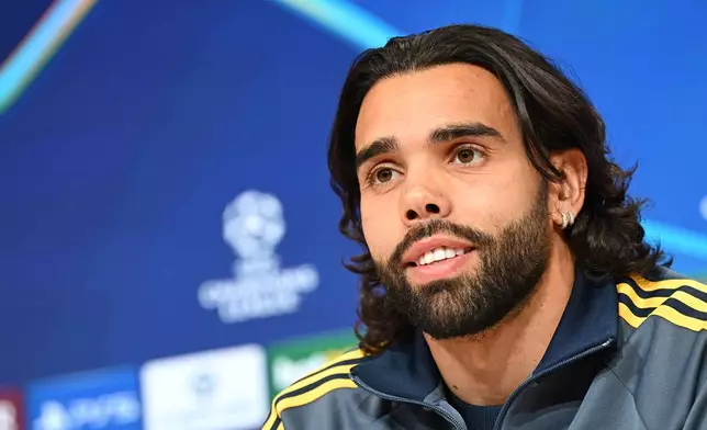 Arsenal goalkeeper David Raya attends a press conference in Munich, Tuesday Oct. 20, 2026, a day ahead of the Champions League soccer match between FC Bayern Munich and FC Arsenal on Wednesday. (Angelika Warmuth/dpa via AP)