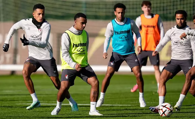 Bournemouth's Junior Kroupi, centre left, attends a training session ahead of the Europa League opening phase soccer match against AC Milan in Bournemouth, Wednesday, Oct. 21, 2026. (Andrew Matthews/PA via AP)
