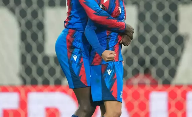 Crystal Palace's Yeremy Pino, right, and Crystal Palace's Jean-Philippe Mateta celebrate their side first goal during the Europa League opening phase soccer match between Besiktas and Crystal Palace in Istanbul, Turkey, Thursday, Oct. 22, 2026. (AP Photo/Emrah Gurel)