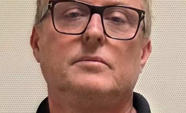 This undated booking photo provided by the Orlando Police Department on Thursday, Oct. 15, 2026, shows Dale Smith Jr. (Orlando Police Department via AP)