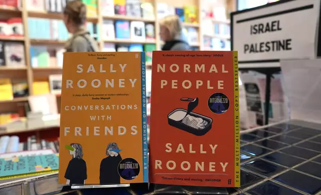 Sally Rooney's books are displayed for sale at a bookshop in London, Thursday, Oct. 15, 2026. (AP Photo/Kin Cheung)