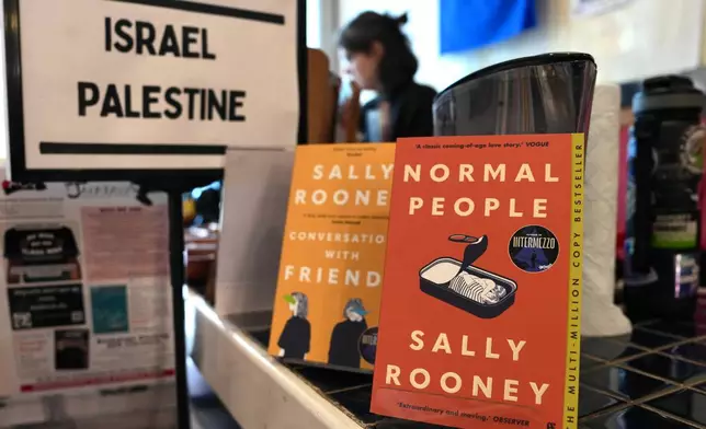 Sally Rooney's books are displayed for sale at a bookshop in London, Thursday, Oct. 15, 2026. (AP Photo/Kin Cheung)