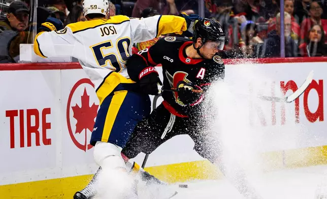 Ottawa Senators' Tim Stutzle (18) vies for the puck against Nashville Predators' Roman Josi (59) during second period of an NHL hockey game in Ottawa, Ontario, Saturday, Oct. 10, 2026. (Keito Newman/The Canadian Press via AP)