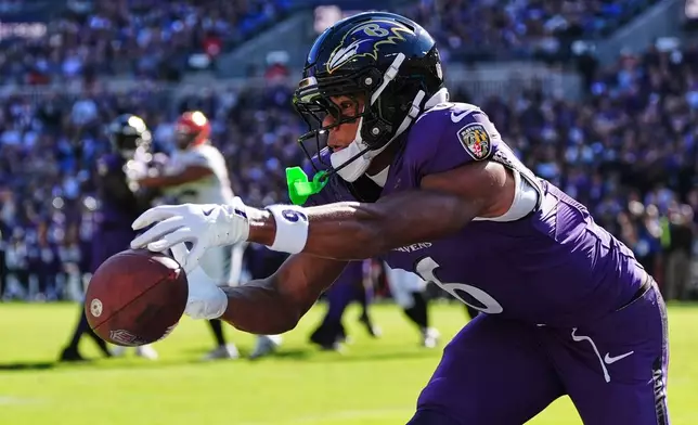 Baltimore Ravens wide receiver Ja'kobi Lane (6) can't make a catch during the first half of an NFL football game against the Cincinnati Bengals in Baltimore, Sunday, Oct. 25, 2026. (AP Photo/Stephanie Scarbrough)
