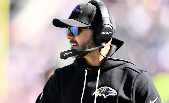 Baltimore Ravens head coach Jesse Minter looks on during the first half of an NFL football game against the Cincinnati Bengals in Baltimore, Sunday, Oct. 25, 2026. (AP Photo/Nick Wass)