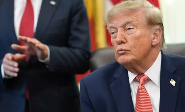 President Donald Trump listens as Centers for Medicare & Medicaid Services administrator Dr. Mehmet Oz speaks in the Oval Office of the White House, Tuesday, Oct. 20, 2026, in Washington. (AP Photo/Jacquelyn Martin)