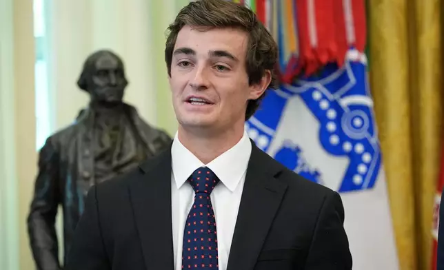Nick Shirley speaks in the Oval Office of the White House, Tuesday, Oct. 20, 2026, during an event with President Donald Trump in Washington. (AP Photo/Jacquelyn Martin)