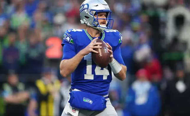 Seattle Seahawks quarterback Sam Darnold looks to pass during the first half of an NFL football game against the Kansas City Chiefs in Seattle, Sunday, Oct. 25, 2026. (AP Photo/Lindsey Wasson)